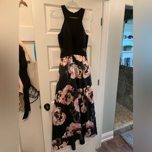 X by x scape wedding guest dress. Black and pink. High low skirt, sheer sides.